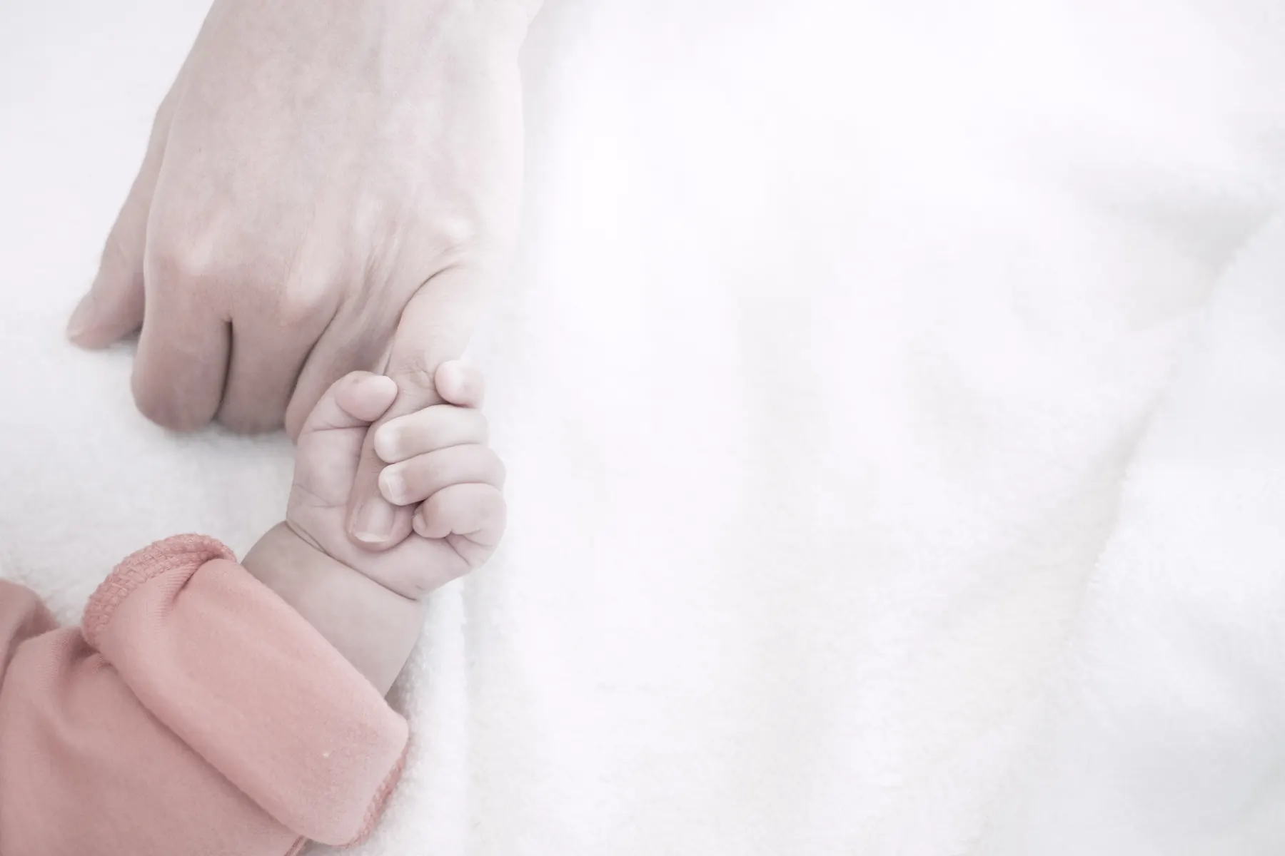 A thoughtfully wrapped gift for a new parent